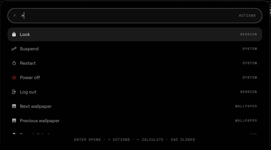 Launcher actions in English: Lock, Suspend, Restart, Power off, Log out, Next wallpaper.